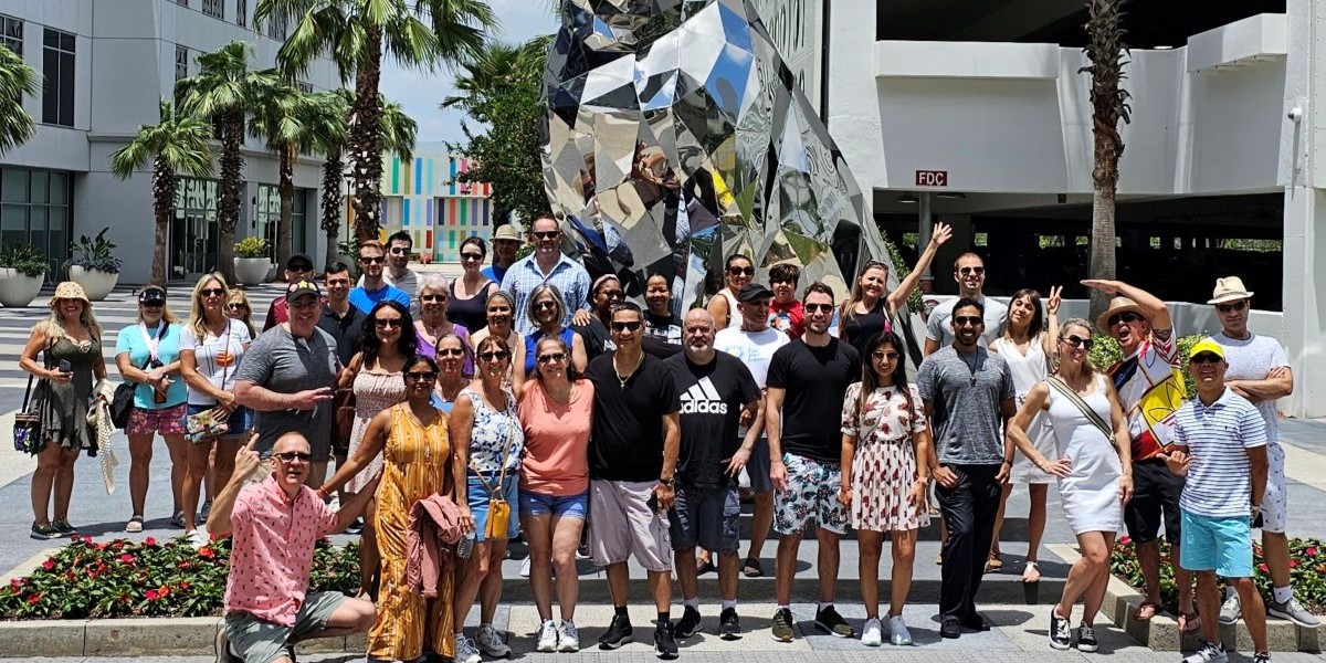 Teams competing in a ClueRally no-download scavenger hunt at Baldwin Park Orlando